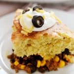 Mexican Beef and Cornbread Bake ~ taco-seasoned beef, black beans, and corn are topped with green chile cheddar cornbread in this quick, easy meal | FiveHeartHome.com