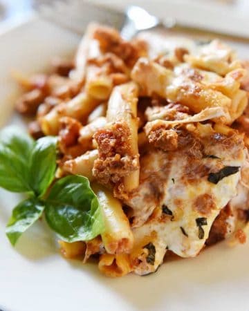 Baked Ziti ~ easy to make and oozing with cheese, this pasta dish is comfort food perfection! | FiveHeartHome.com