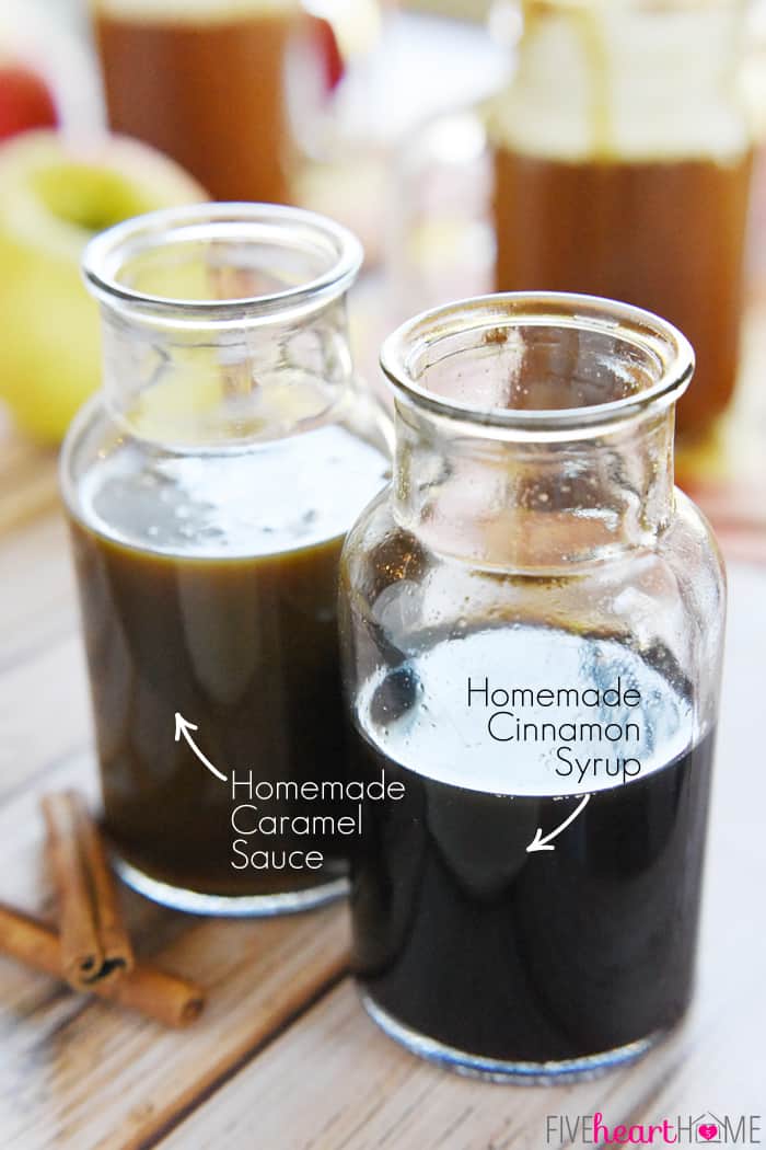 Two Glass Jars Labeled Homemade Caramel Sauce and Homemade Cinnamon Syrup