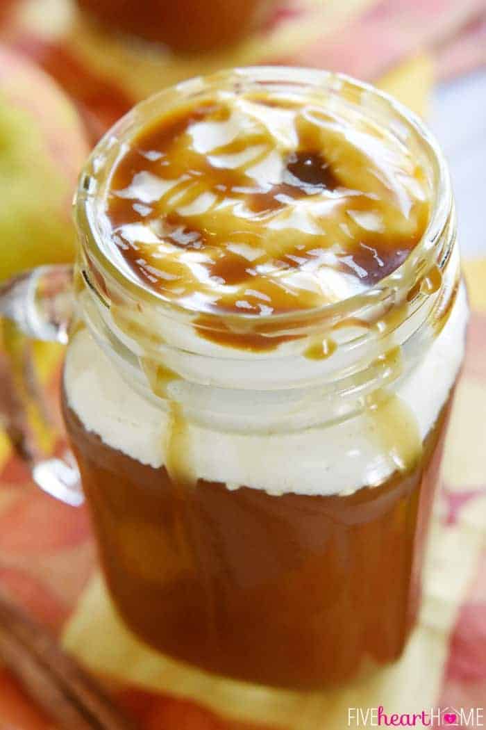 Caramel Apple Cider in a Handled Mason Jar Topped with Sticky, Sweet Caramel 