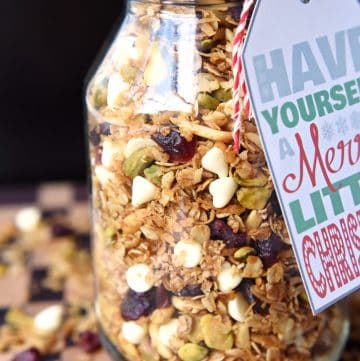 Gingerbread Granola with Cranberries, Pistachios, and White Chocolate Chips ~ warm spices and Christmas colors make this a perfect holiday breakfast or homemade food gift! | FiveHeartHome.com