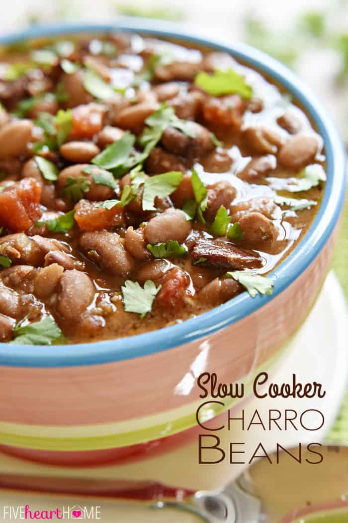 Slow Cooker Charro Beans ~ flavored with bacon, garlic, tomatoes, green chiles, jalapeños, cilantro, and spices, this easy crockpot recipe is a perfect side dish for your favorite Mexican food! | FiveHeartHome.com via @fivehearthome