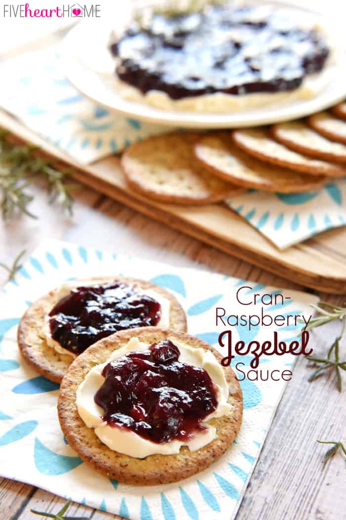 Cran-Raspberry Jezebel Sauce ~ with its bold horseradish kick, this sweet and spicy, versatile sauce can be poured over cream cheese as an appetizer, served alongside holiday ham or turkey as a condiment, or given as a homemade food gift in a jar! | FiveHeartHome.com