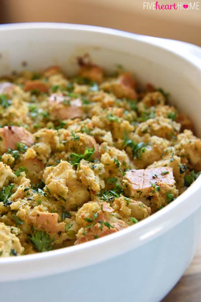 Cornbread Stuffing with garlic and herbs in baking dish.