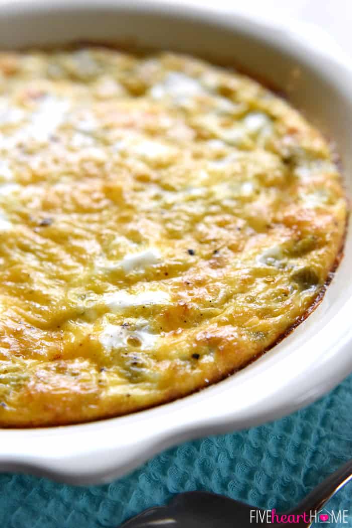 Green Chile Cheddar Egg Bake in a White Casserole Dish 