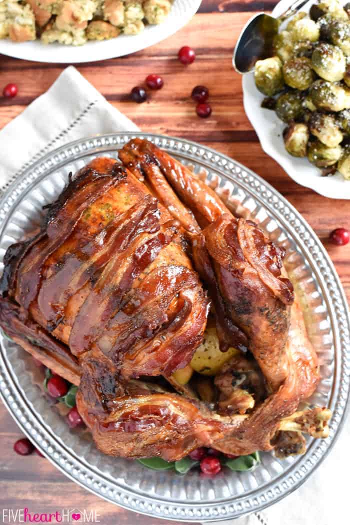 Aerial View of Maple-Glazed Turkey with Bacon and Sage Butter on Silver Platter