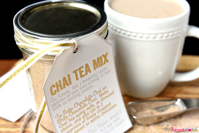 Jar of Chai Tea Mix Next to a Cup of Filled with Chai 