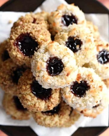 Thumbprint Cookies ~ classic cookies that are lightly sweet with a shortbread-like texture, a coating of toasty coconut or pecans, and a center of your favorite jam | FiveHeartHome.com