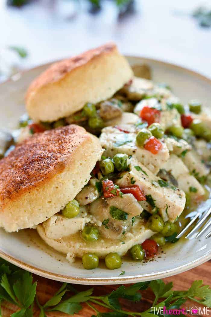 Plate with two topped Chicken ala King biscuits.