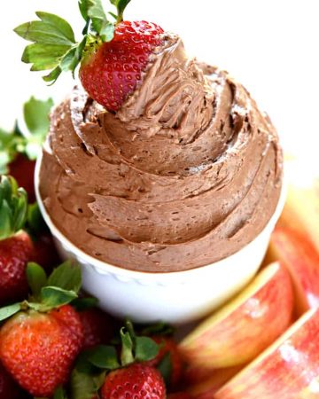 Fluffy Chocolate Fruit Dip with strawberry on top.