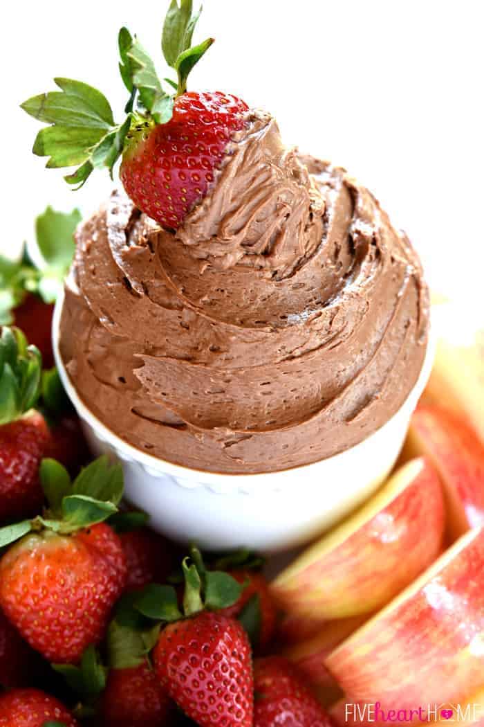 Surrounded By Fruit and Topped with a Strawberry 