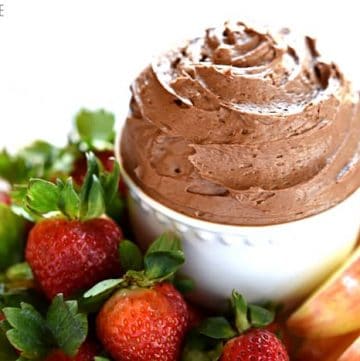 Fluffy Chocolate Fruit Dip ~ made with cream cheese, melted chocolate, and real whipped cream, this dessert tastes just like dipping fresh fruit into chocolate cheesecake! | FiveHeartHome.com