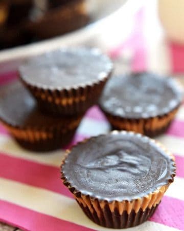 Homemade Peanut Butter Cups ~ these easy, all-natural peanut butter cups whip up with just three ingredients! | FiveHeartHome.com
