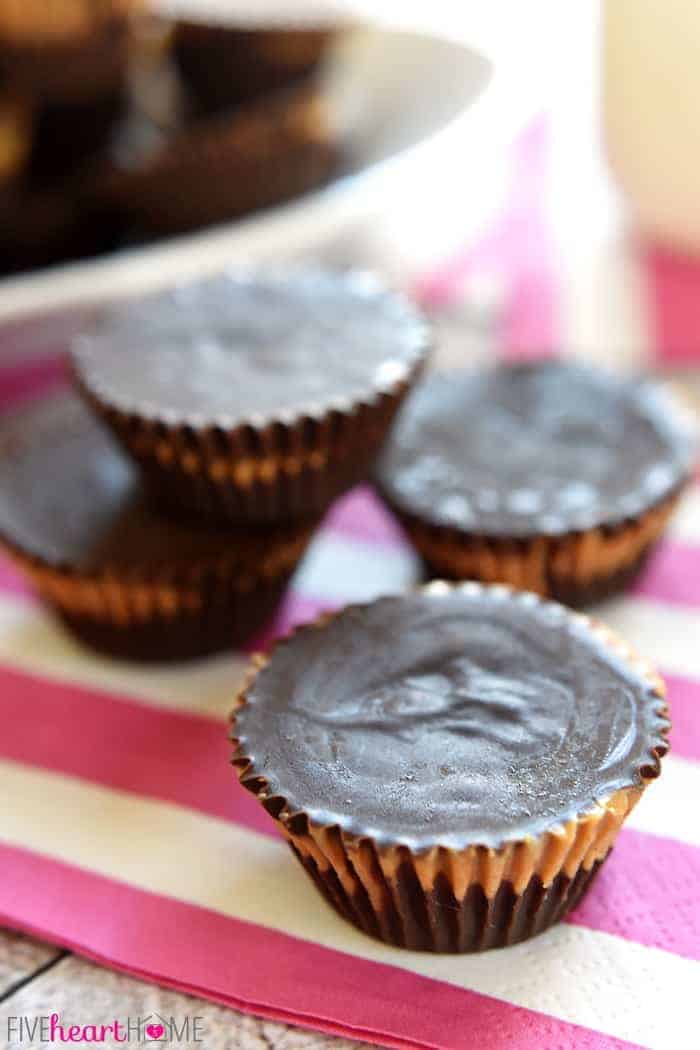 Homemade Peanut Butter Cups ~ these easy, all-natural peanut butter cups whip up with just three ingredients! | FiveHeartHome.com Close-Up Showing Peanut Butter Peeking Through the Chocolate
