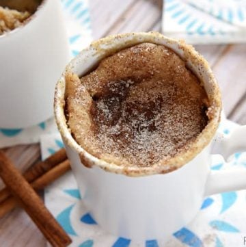 Snickerdoodle Mug Cake ~ bakes up in the microwave in just one minute, yielding a warm, cinnamon-sugary treat that will satisfy any sweet tooth! | FiveHeartHome.com