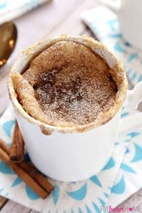 Snickerdoodle Mug Cake ~ bakes up in the microwave in just one minute, yielding a warm, cinnamon-sugary treat that will satisfy any sweet tooth! | FiveHeartHome.com