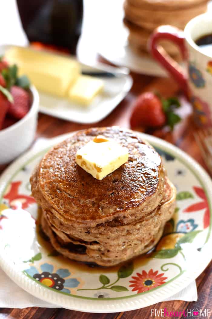 Stack of whole wheat pancakes on a plate.