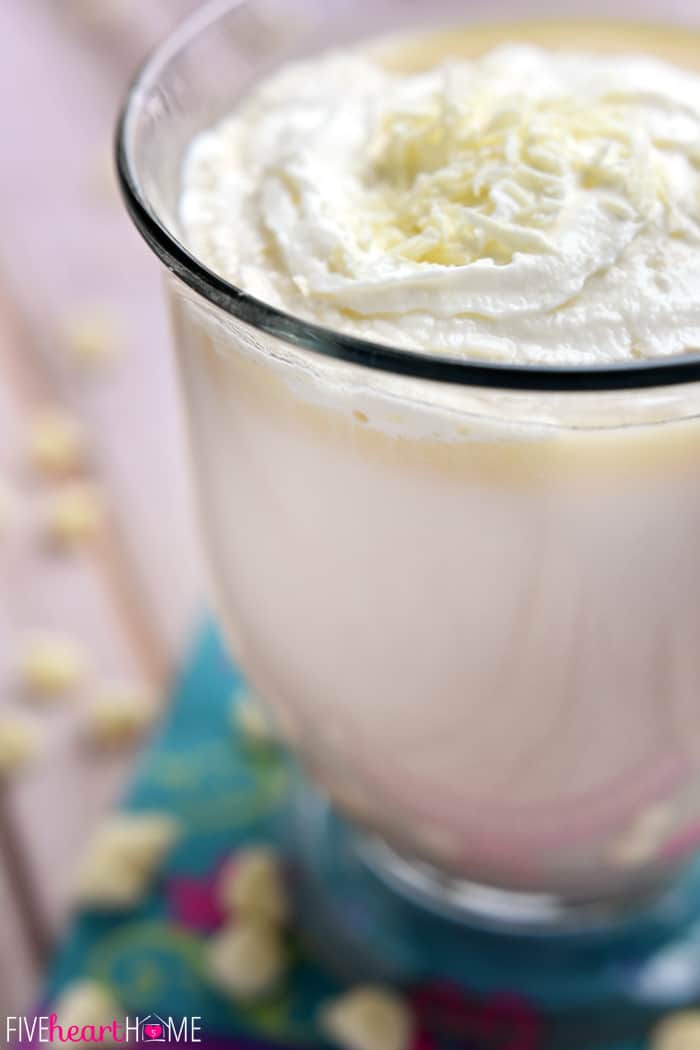 Close-Up of Mug with Whipped Cream and White Chocolate Shavings 