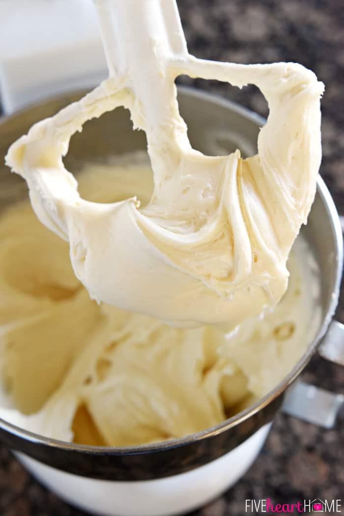 Cream Cheese Frosting on the beater of a stand mixer.