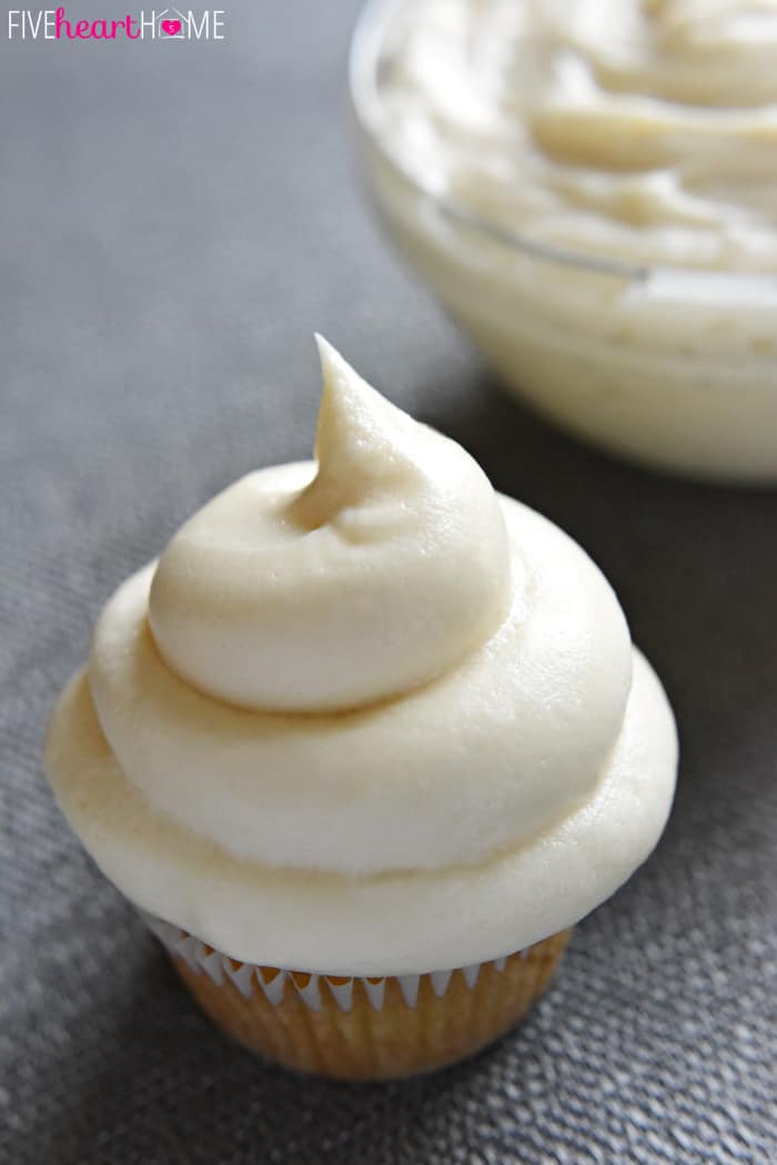 Cream Cheese Frosting on a cupcake and in a bowl.