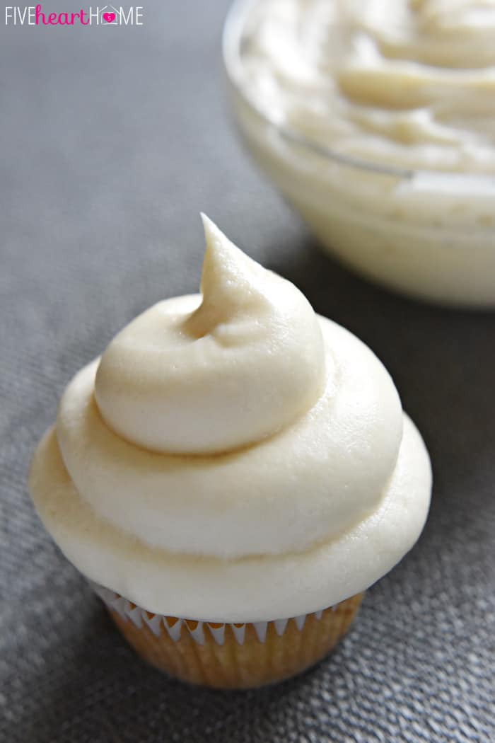 Cream Cheese Frosting on a cupcake and in a bowl.