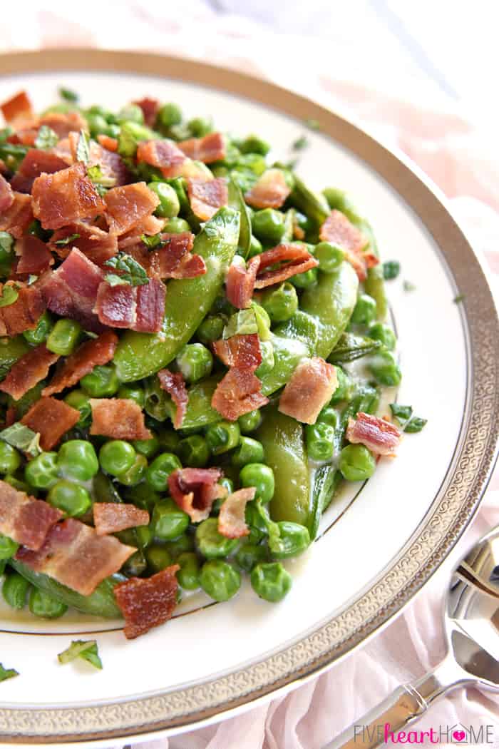 Creamed Peas on a gold-rimmed plate.