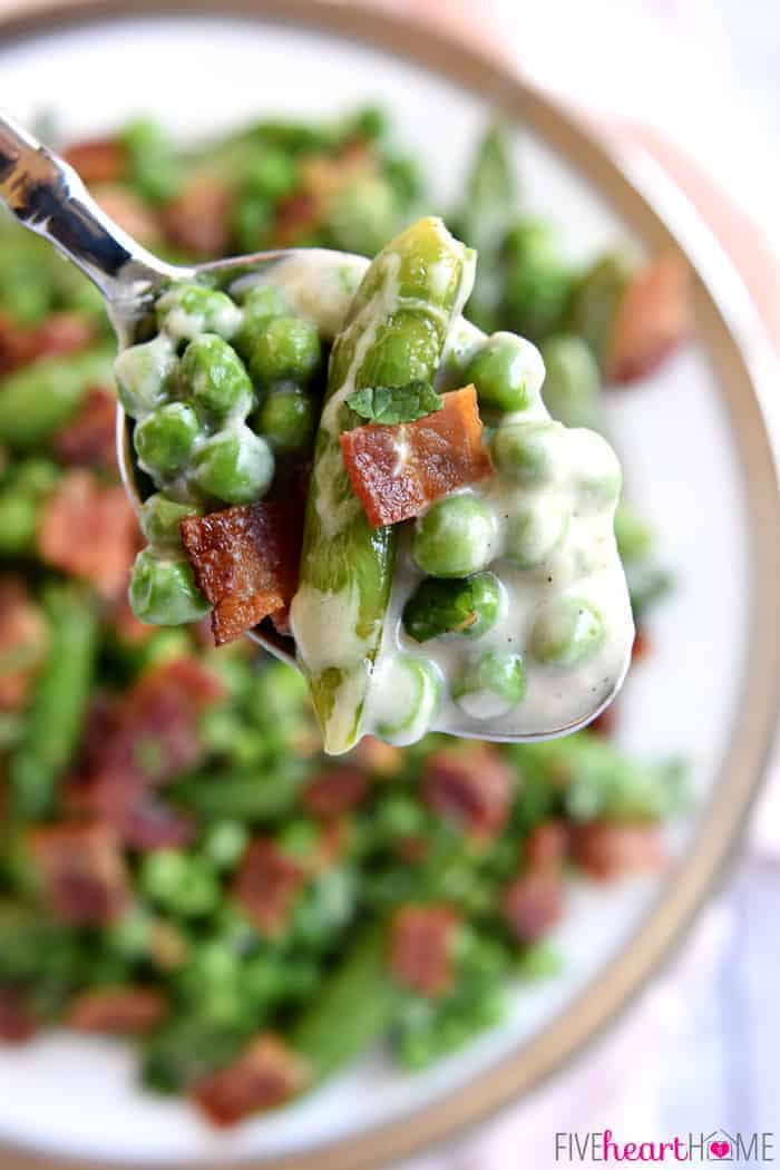 Aerial view of a spoonful of Creamed Peas.