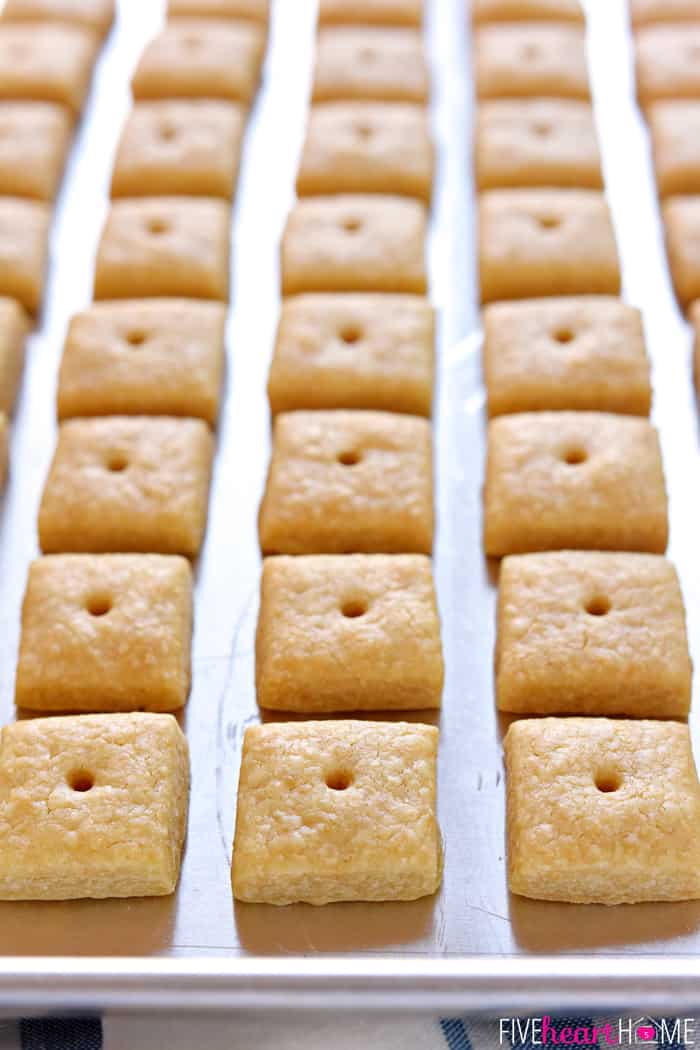 Rows of Cheese Crackers on baking sheet.