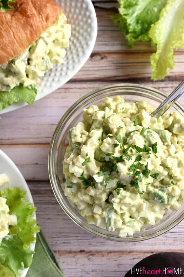 Aerial view of Avocado Egg Salad in bowl and on croissant.