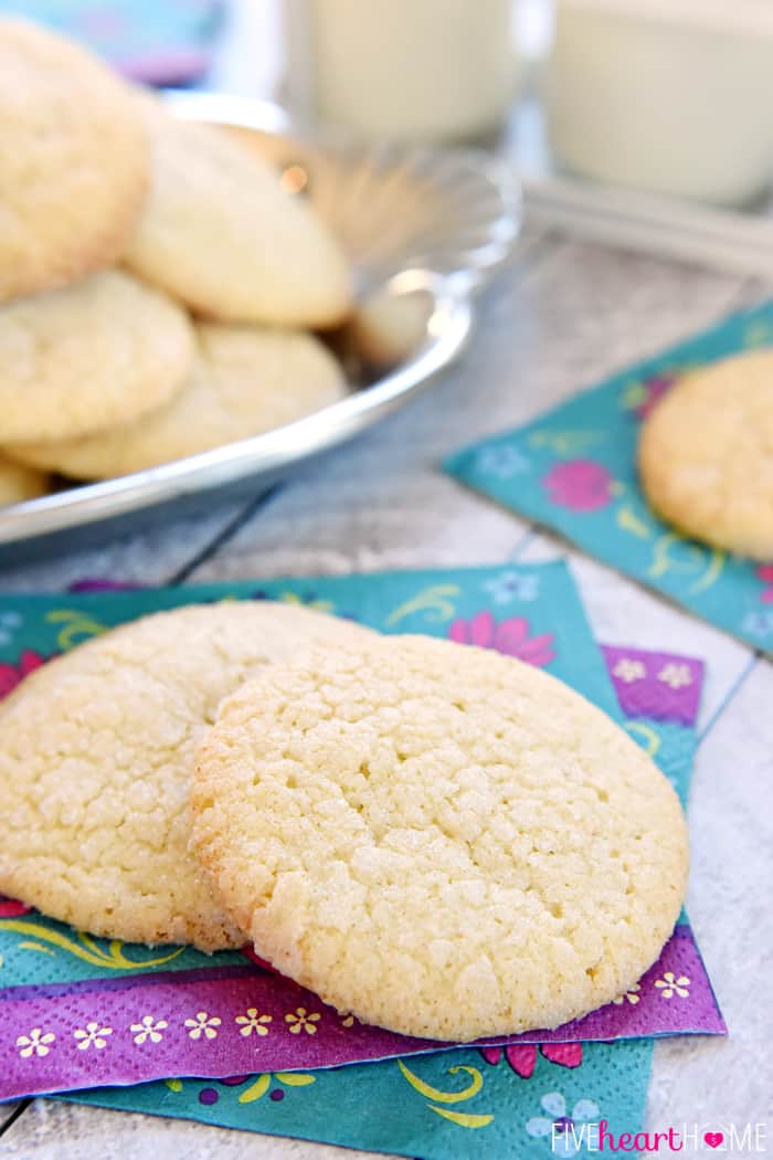 Soft Sugar Cookies ~ easy to make because they require NO ROLLING! They're tender and puffy with a crunchy coating of sugar and loads of vanilla flavor! | FiveHeartHome.com Soft Sugar Cookies on decorative napkins.
