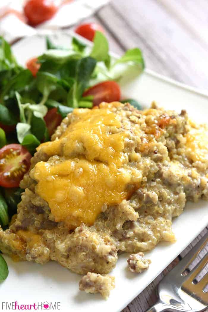 Cheesy Beef & Quinoa Bake ~ a simple, wholesome, easy-to-make casserole featuring just a handful of ingredients including ground beef, quinoa, Greek yogurt, and cheddar...perfect for picky eaters and busy weeknights! | FiveHeartHome.com Serving on a white square plate with a side salad