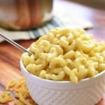 Homemade One-Pot Stovetop Macaroni and Cheese in a white bowl with a spoon