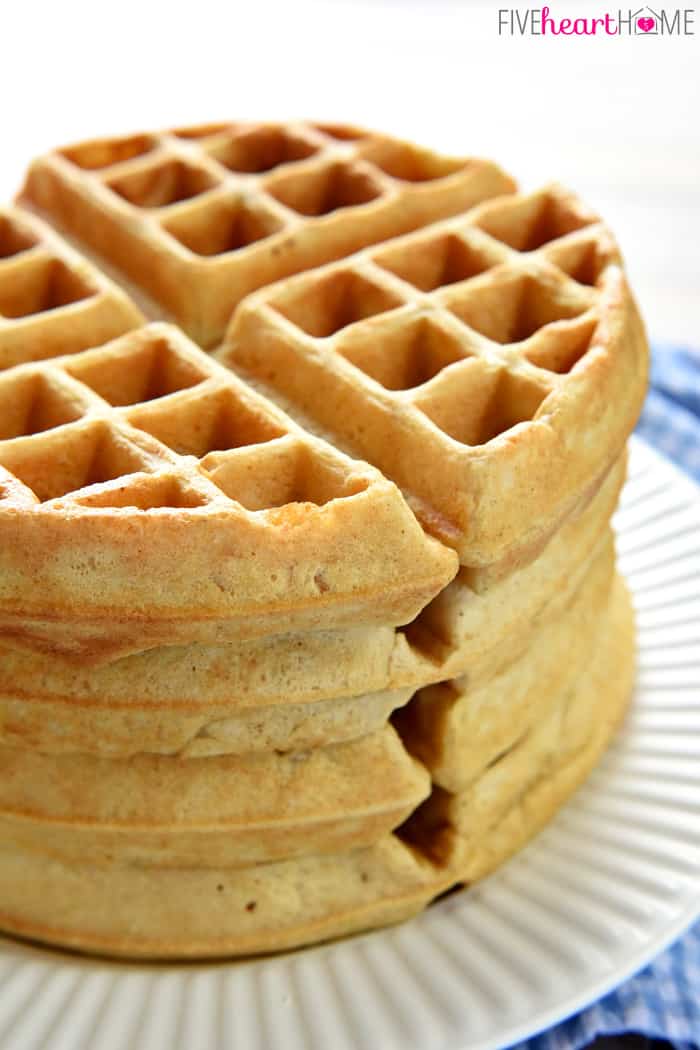 Homemade Whole Wheat Waffle Mix ~ an economical pantry staple for conveniently whipping up fluffy, all-natural, 100% whole wheat waffles! | FiveHeartHome.com Stack of homemade whole wheat waffles.