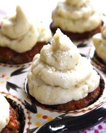 Italian Meatloaf "Cupcakes" with Mashed Potato Frosting ~ savory meatloaf is flavored with Parmesan, Italian herbs, and marinara sauce, baked in a muffin pan, and then topped with seasoned mashed potatoes in these easy to make, fun to eat, mini meatloaves | FiveHeartHome.com