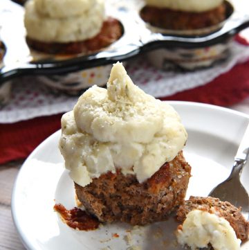 Italian Meatloaf "Cupcakes" with Mashed Potato Frosting ~ savory meatloaf is flavored with Parmesan, Italian herbs, and marinara sauce, baked in a muffin pan, and then topped with seasoned mashed potatoes in these easy-to-make, fun-to-eat, mini meatloaves | FiveHeartHome.com