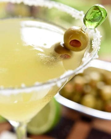 Mexican Martini ~ like a margarita on the rocks with a splash of olive juice, this Mexican Martini is a copycat recipe of the famous cocktail from Trudy's in Austin | FiveHeartHome.com