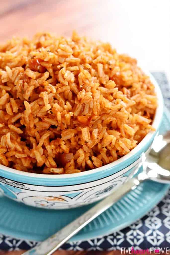 Easy Spanish Rice ~ cook a pot of rice using chicken broth, tomato sauce, and a few seasonings to make this quick and easy Spanish Rice...it's the perfect base for rice bowls or a delicious side dish to your favorite Mexican entrees! | FiveHeartHome.com
