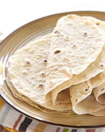 Easy Homemade Flour Tortillas ~ soft and tender homemade tortillas are deliciously versatile and surprisingly easy to make with just a few simple ingredients! | FiveHeartHome.com