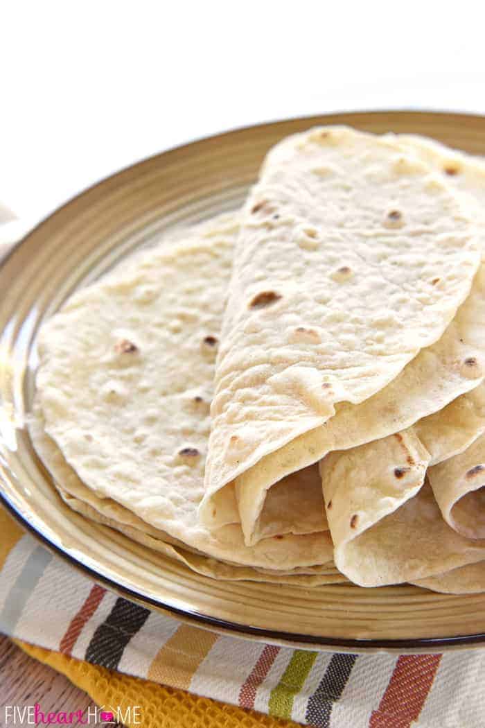 Easy Homemade Flour Tortillas ~ soft and tender homemade tortillas are deliciously versatile and surprisingly easy to make with just a few simple ingredients! | FiveHeartHome.com