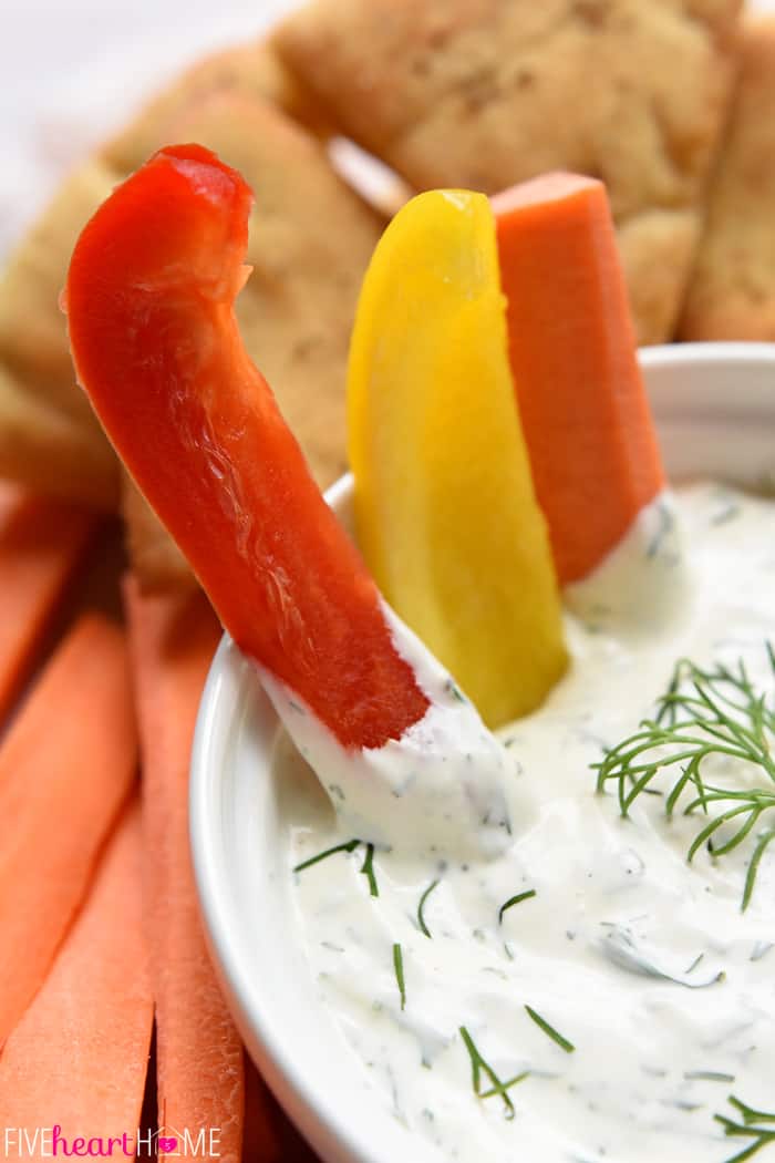 Close-up of veggies sticking out of bowl.