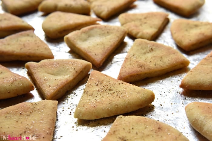 Baked Pita Wedges on a sheet pan.