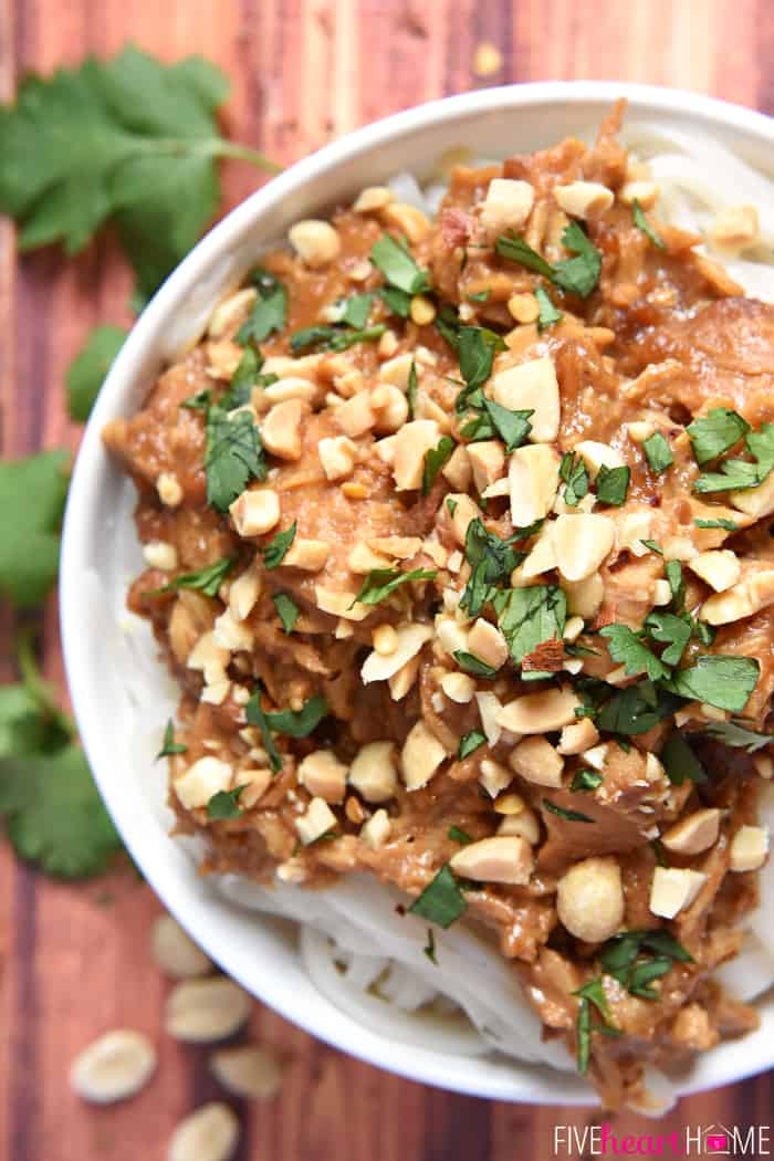 In a bowl garnished with peanuts and cilantro