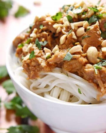 Slow Cooker Thai Chicken with Peanut Sauce over rice noodles