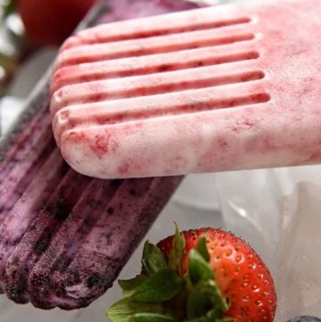 Close-up of Yogurt Popsicles in strawberry and bluebery flavors.