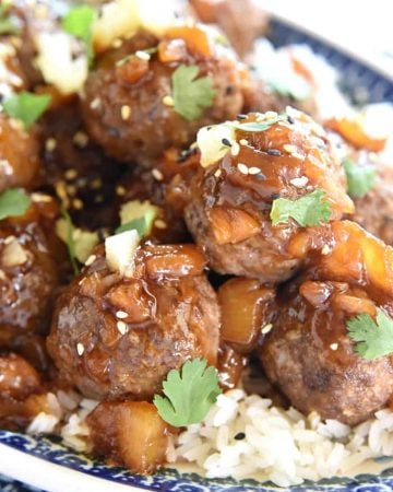 Hawaiian Meatballs ~ juicy homemade meatballs are smothered with a sweet and sticky, Polynesian pineapple sauce in this quick and easy dinner recipe | FiveHeartHome.com