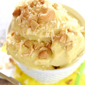 Tropical Banana "Ice Cream" ~ features frozen bananas, pineapple, and mango whipped to an ice cream-like consistency for an all-natural, all-fruit treat with no added sugar...decadent enough for dessert yet healthy enough for breakfast! | FiveHeartHome.com