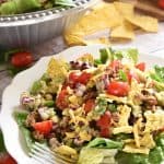 Ultimate Taco Salad ~ an explosion of contrasting flavors and textures, from spicy taco meat and velvety black beans to acidic tomatoes and crisp fresh corn, all topped with crunchy tortilla chips and a creamy, cilantro-flecked Avocado Ranch Dressing! | FiveHeartHome.com