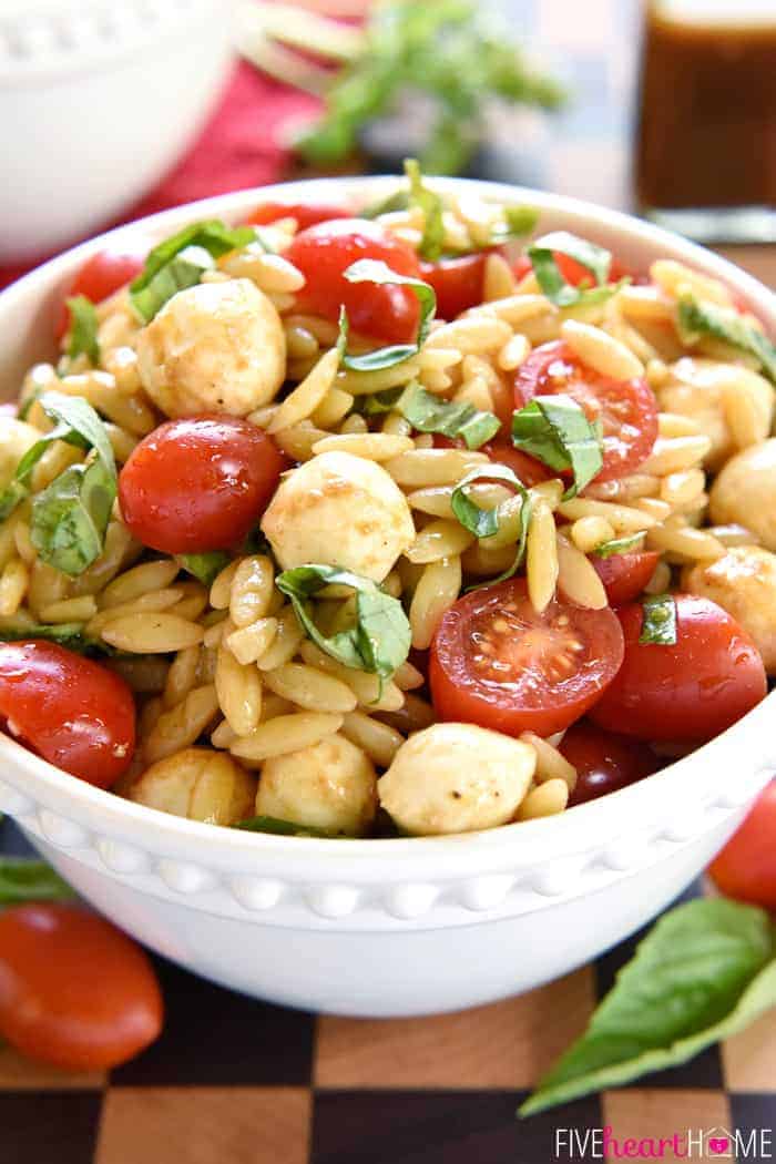 Caprese Orzo Salad in a white bowl