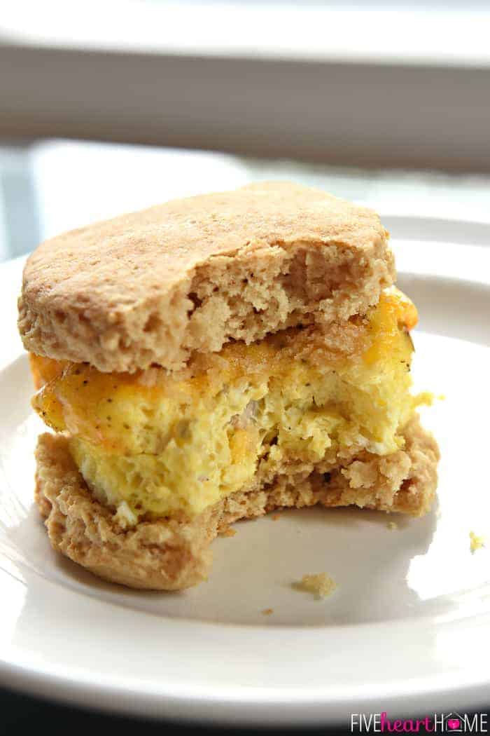 Freezer Breakfast Sandwich on a plate with big bite missing.