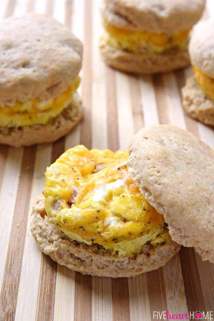 Open-faced biscuit filled with eggs, cheese, and ham.